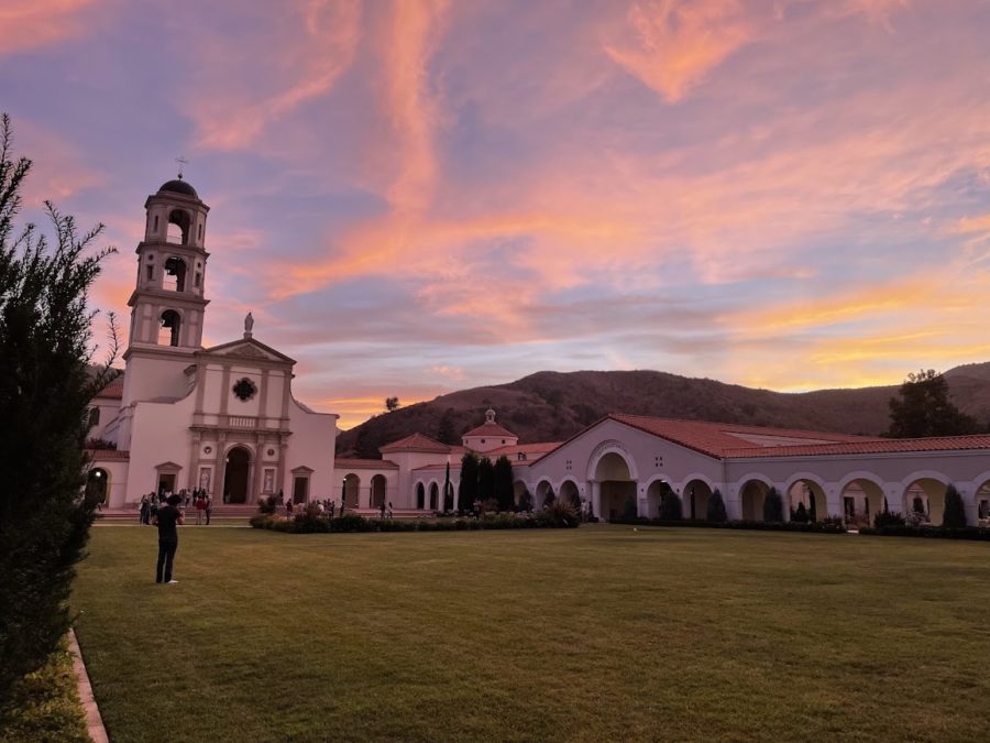 A beautiful sunset behind Our Lady of the Most Holy Trinity Chapel. Photo Provided by: Elena Walz. 