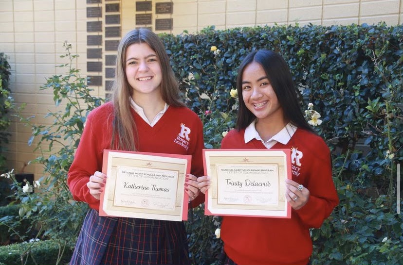 Katherine Thomas 22 and Trinity Delacruz 22 smiling with their awards. Photo Credit: @rosaryroyals on Instagram
