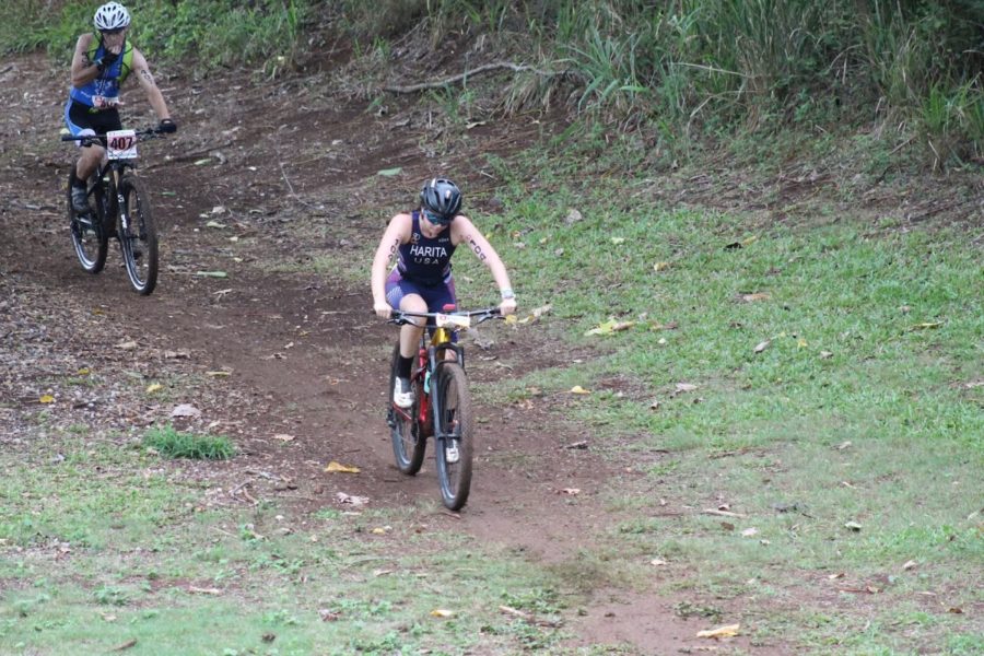 Elizabeth tearing down the muddy slopes of Maui at the Xterra World Championship triathlon. (Photo Provided by Elizabeth Harita 22)