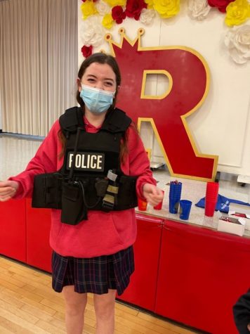 Allison Lillestol dresses up in the speakers police vest. (Photo Provided by Allison Lillestol.)