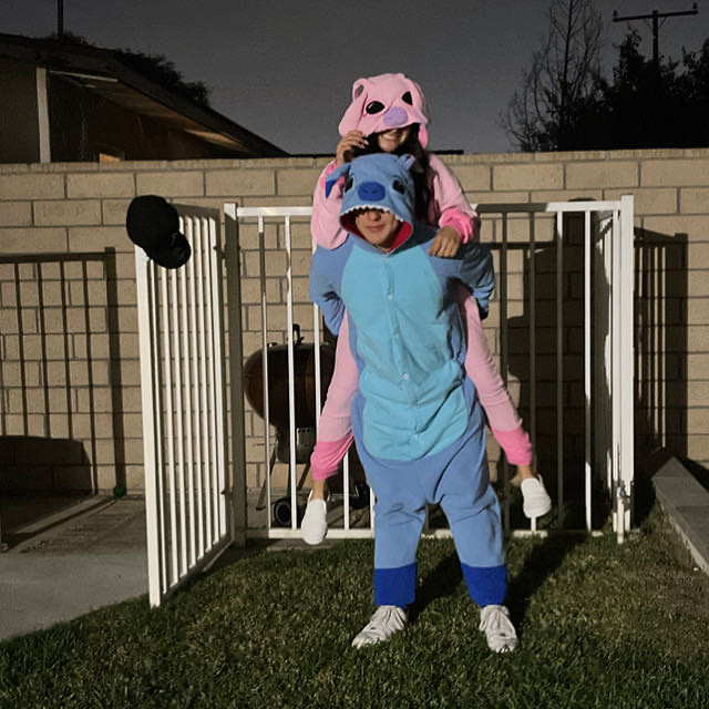 Brianna and Carlos DAngelo dressed up in Angel and Stitch costumes.