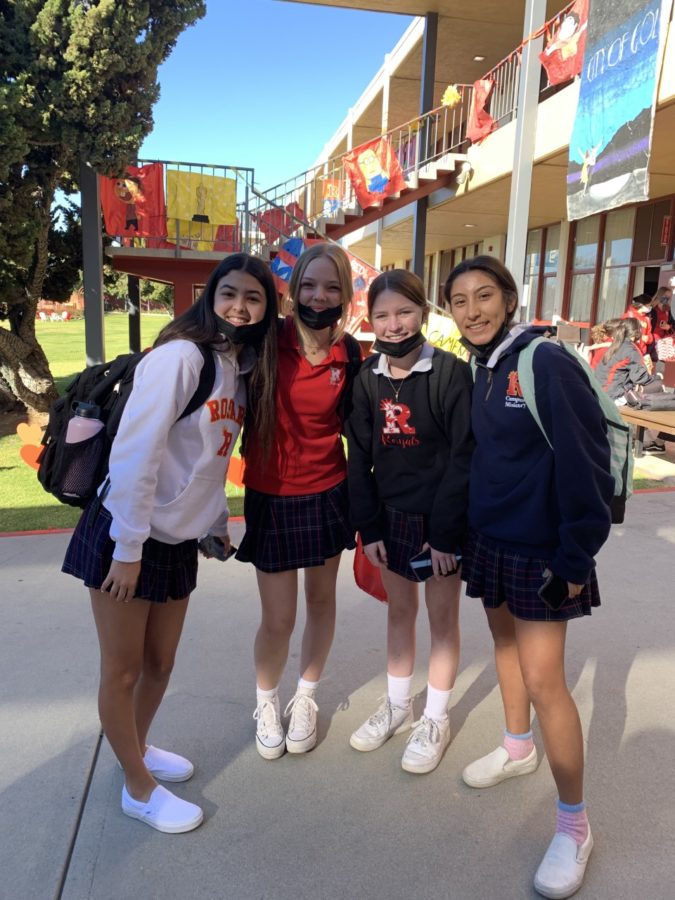 Freshmen+Veronica+Mercado%2C+Alyssa+McCreary%2C+Ava+Fredman%2C+and+Elaina+Borbon+all+smile+after+a+long+Red+and+Gold+practice.+%28Photo+Credit%3A+Kathleen+Martinez.%29