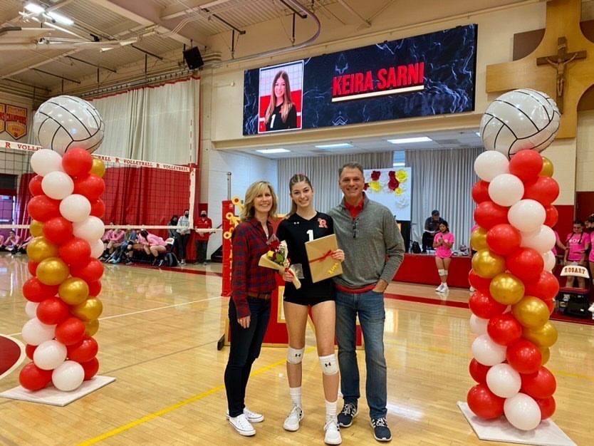 My parents and I celebrate four years of volleyball for Rosary Academy on senior night.