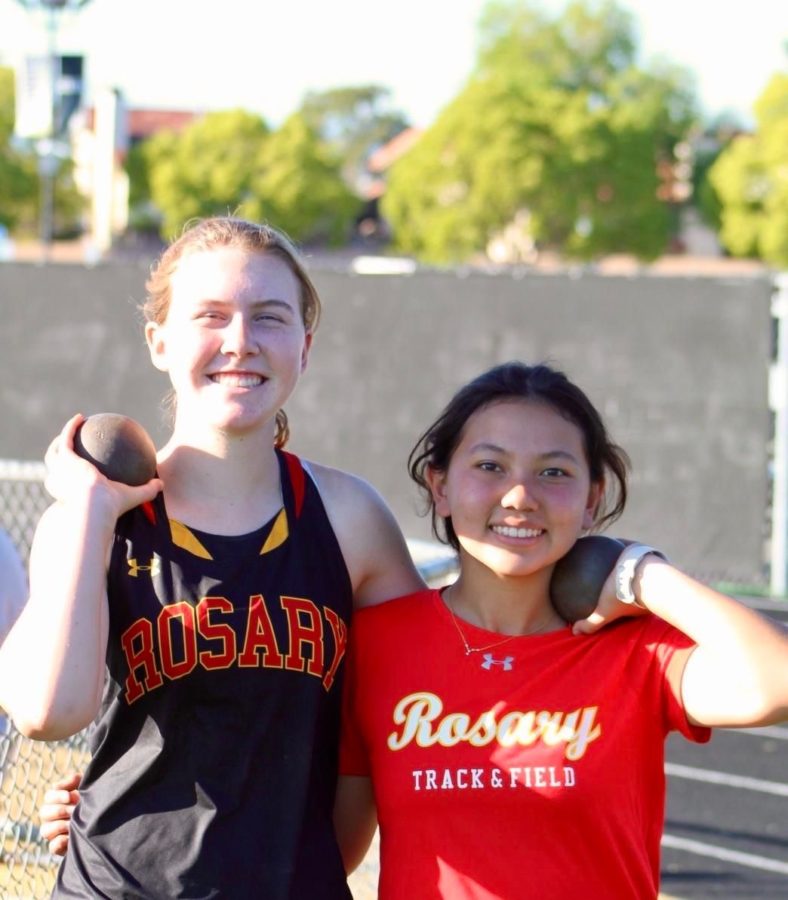 Kristen Hayward 24 and Sara Garcia 24, two of the shot-putters on the track team.