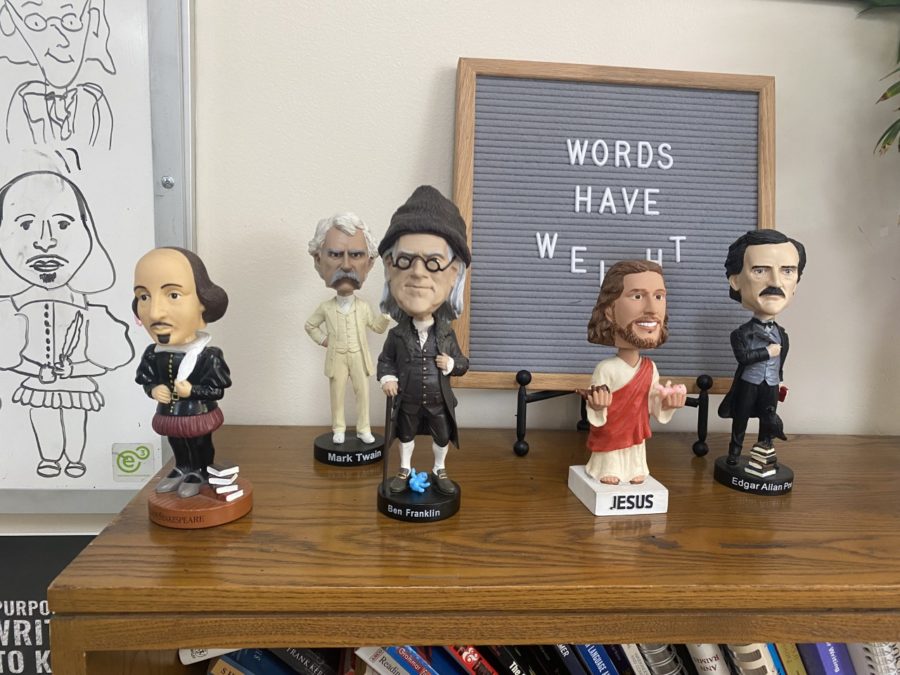 Ms. Barclays bobbleheads stare into students souls as they enter her classroom everyday. (Photo Credit: Daly Holman)