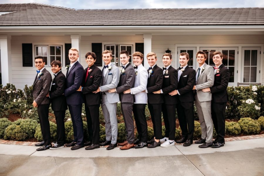 A group of Servite boys (who probably got dressed around 4:30 pm) pose for a picture before prom. (Photo Provided by Daly Holman)