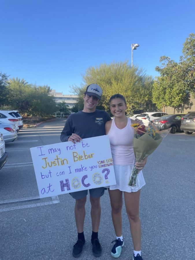 Ava Fishman '24 poses in her fashionable tennis fit with her date, Nicholas Cwiertny '24.
