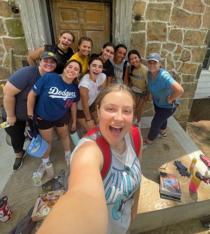 The best group all smiles after a long day at the worksite (Photo Credit: Finley Hawkins)