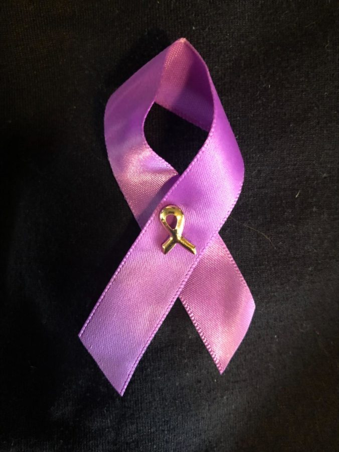 Wearing a purple ribbon in October is an easy way to support victims and survivors.