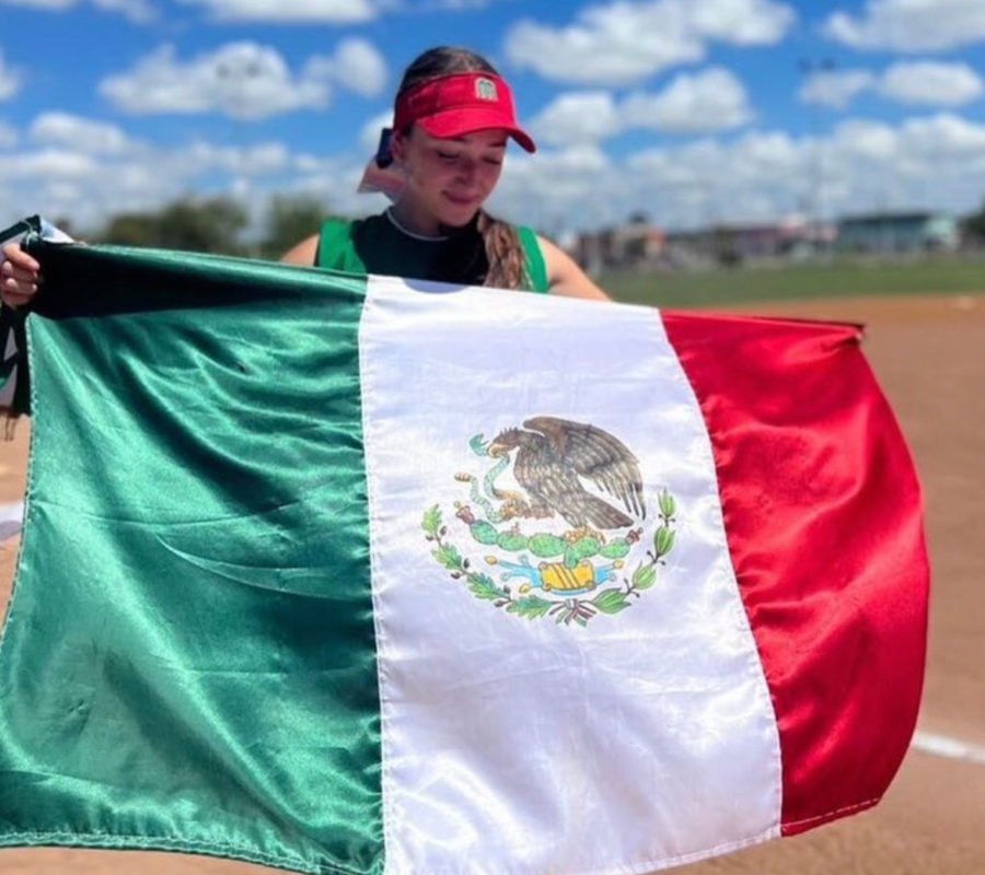 Anahi Pintado poses with the beautiful flag of Mexico. (Photo Provided by Anahi Pintado)