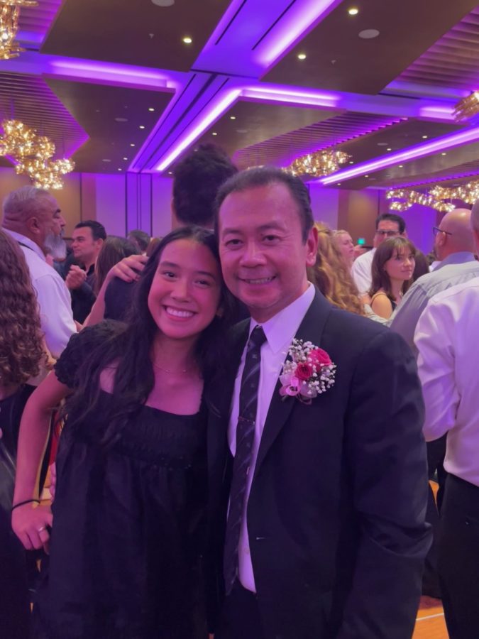 Sydney Rosario ‘23 and her dad striking a pose after attempting to demolish the dance floor.
