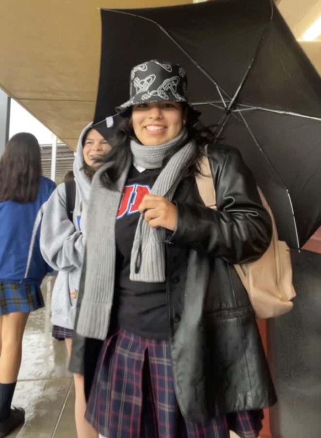 Juliet serves looks in her Vivienne Westwood bucket hat and her leather jacket. (Photo provided by: Juliet Cortez)