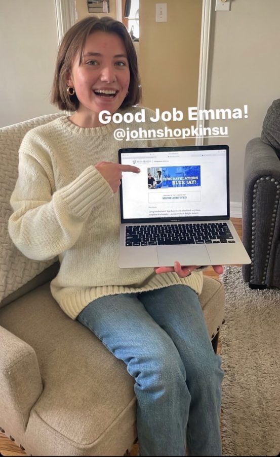 Emma Fredman with her acceptance letter to John Hopkins University!