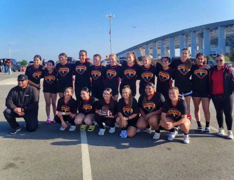 The Girls Flag Football team all gather for a photo before their first game. (Photo taken from Instagram @Rosaryroyals)