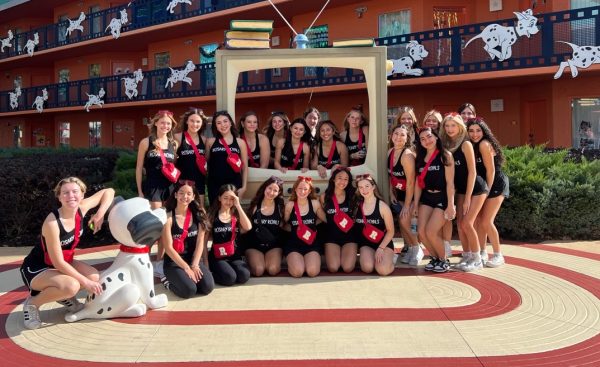 The cheer team posed next to this cute photo op at their hotel.