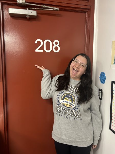 Even though I am smiling, I am so sad to leave this classroom.