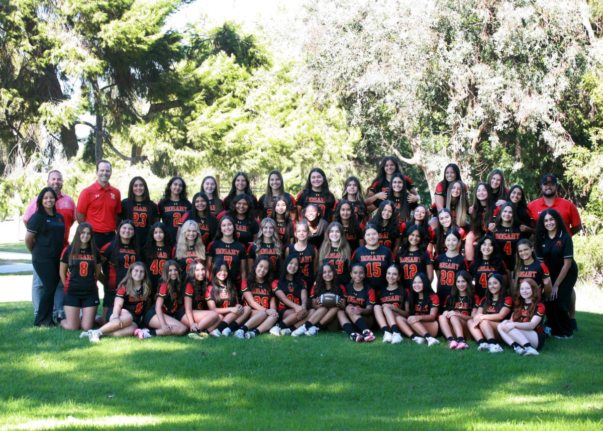 Rosary JV and Varsity flag football team together for a program picture. 