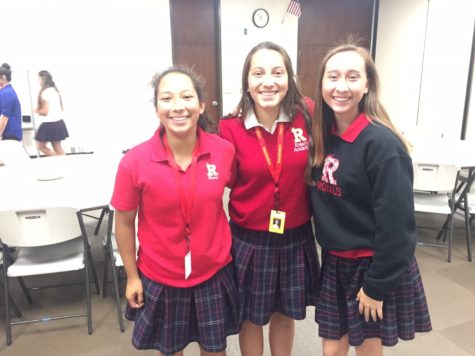 Freshman President Christina Borbon, middle, poses with two friends after her speech.