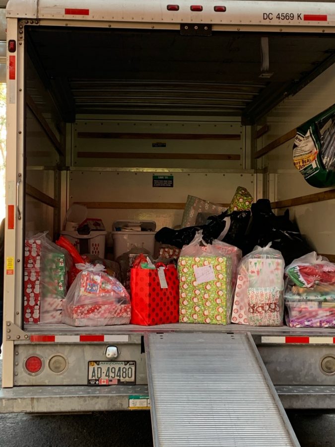 Crittenton Club holiday gifts being prepared for departure.