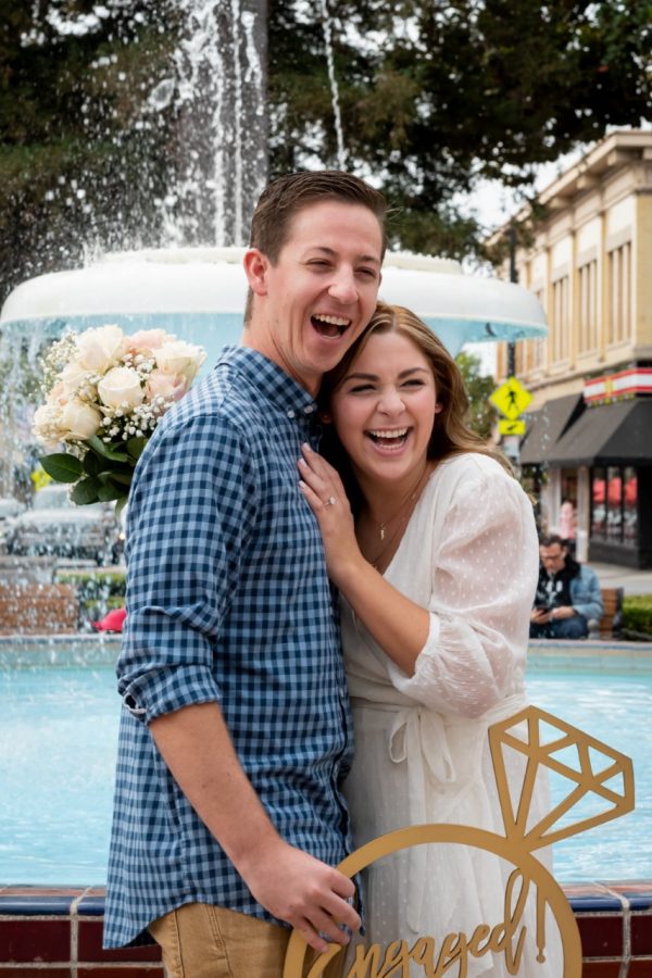 Ms. Leubke and her fiancé pose for a cute picture after the proposal. 