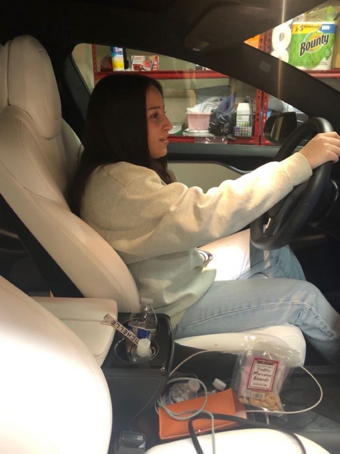 Marlie Machado '23 becomes familiar with the steering wheel.  