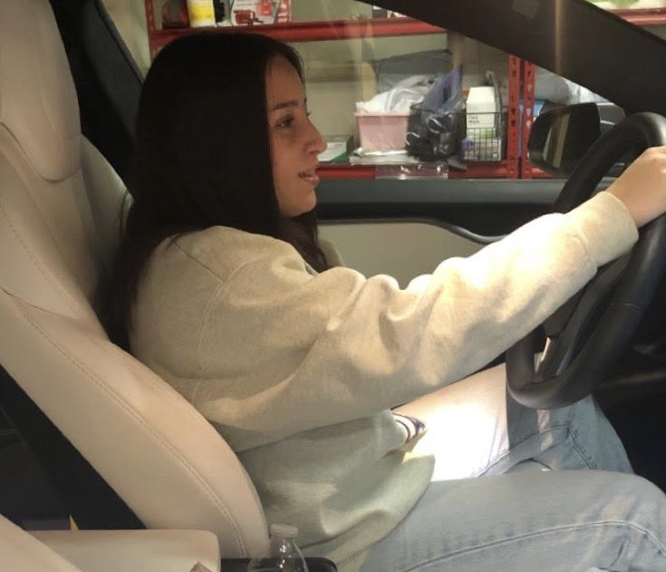 Marlie Machado '23 becomes familiar with the steering wheel.  