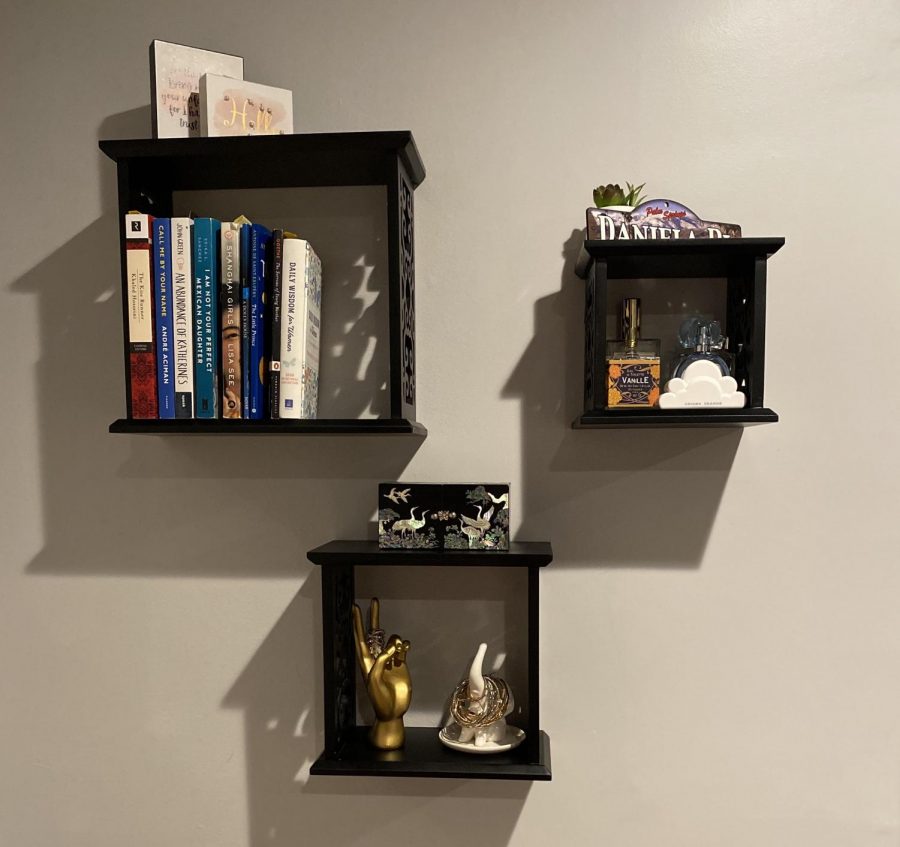 Decorative shelving my mother installed for me to keep my 

books, perfumes, jewelry, and other small decorations organized. 