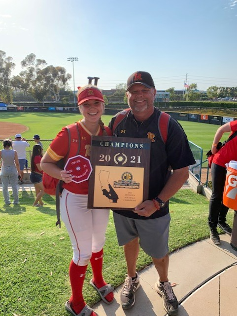 Coach Tice and Abigail Tice '22 proudly hold their award after winning the CIF Championship. 