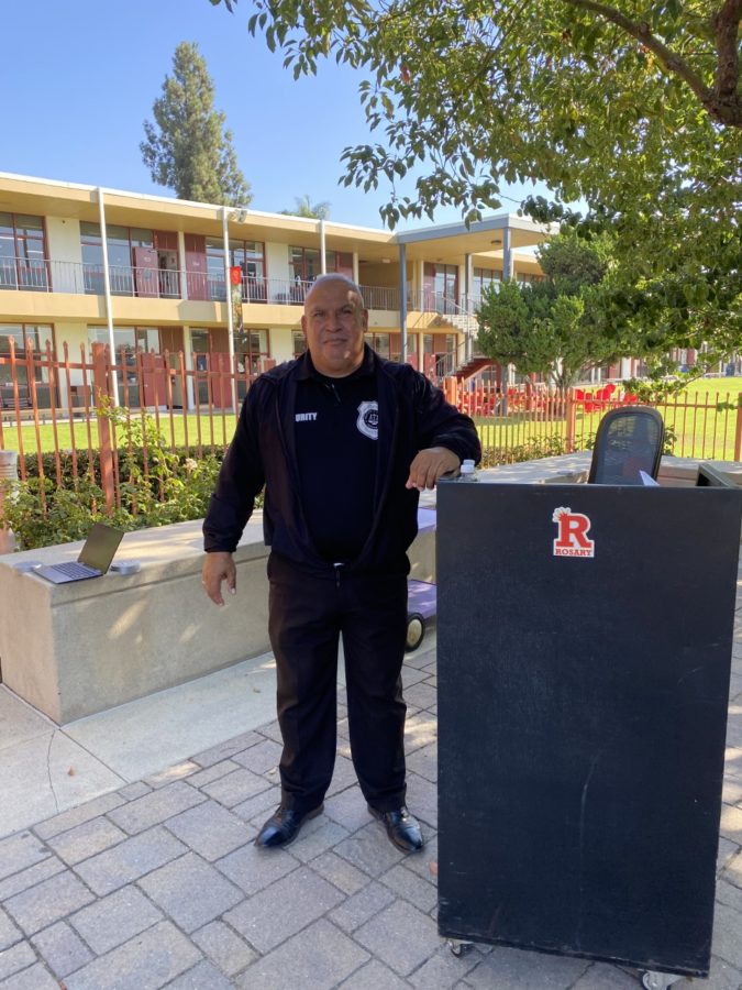 David poses alongside his podium in the front parking lot which he happily greets Royals by on Tuesdays and Wednesdays. 