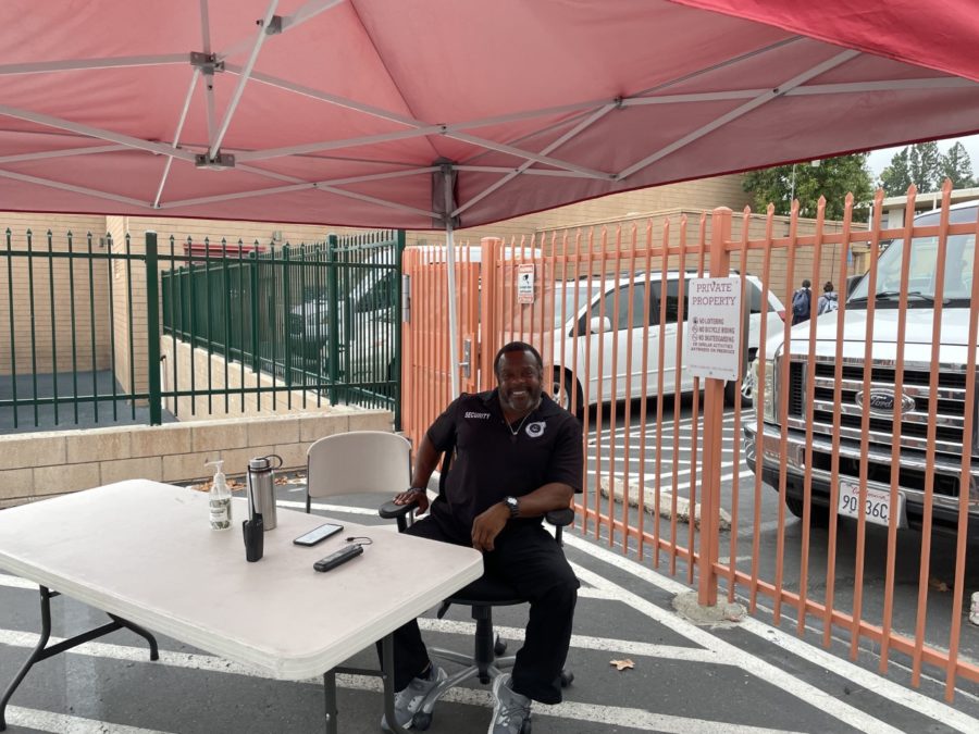 Maurice siting at his station in the back parking lot.
