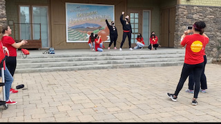 One of the groups performing there original dance to BTS's song "Butter" for the dance competition.