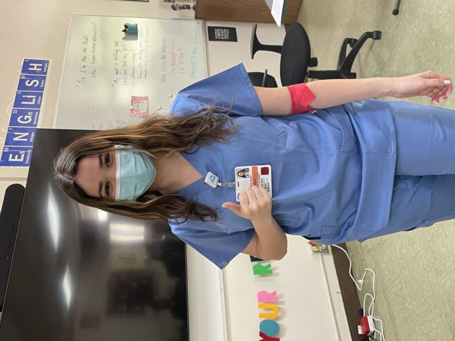 Kimberly Gallo '22 posing after donating blood on Friday's Halloween blood drive.
Photo Credit: Mary Nassar '22
