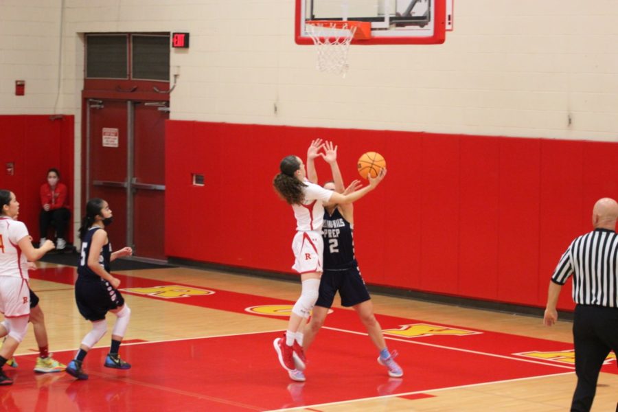 Allison Clark '24 going up for a lay-up.