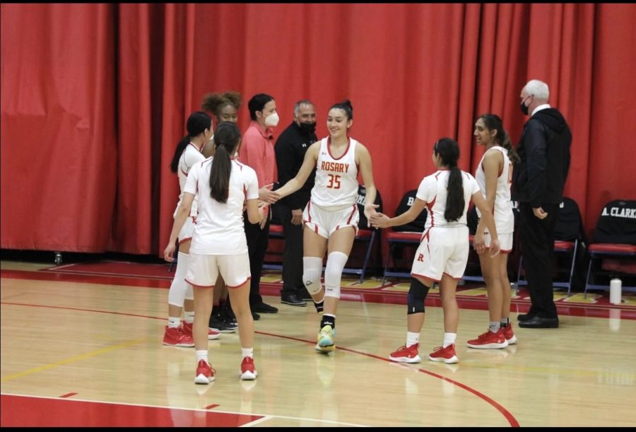 Ava Doniguez '23 getting ready to play Mater Dei with the team.