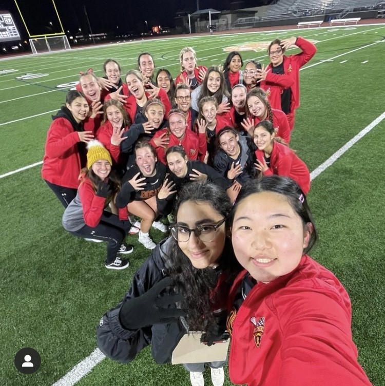 The team smiling on the field! (Photo provided by Amanda Angle '22)