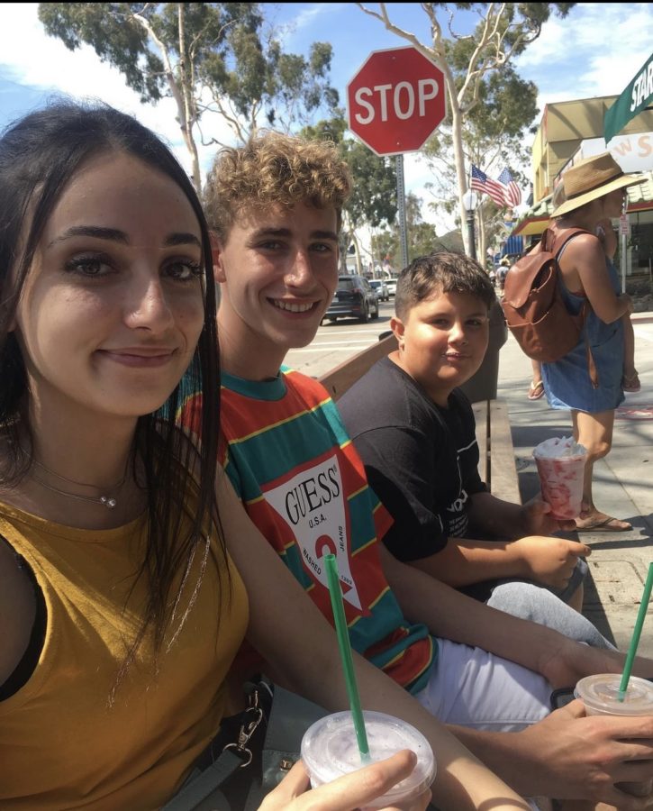 Elliot and his sister smile with Kathleen and Elizabeth's little brother Ben.(Photo Credit: Kathleen Martinez)