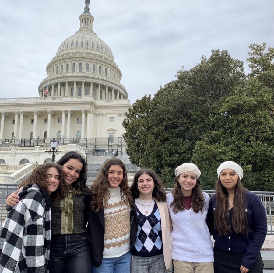 From left to right: Gabrielle Lazo 25, Juliet Cortes '23, Alyssa Ramirez '24, Mary Nassar '22, Rebecca Nassar '25, and Jenny Hurtado '23 beaming in front of the Capitol Building. (Photo Provided by @rosaryroyals Instagram)