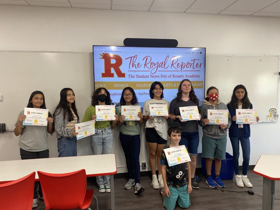 The writing camp kids are all smiles with their camp diplomas in hand.