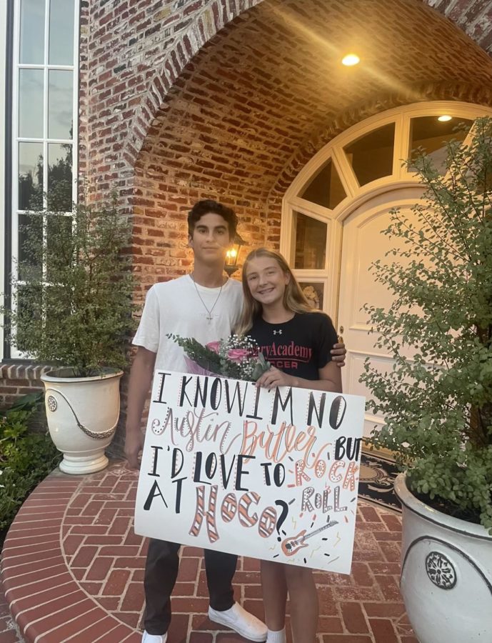 Here is Bridgid LeVecke '26 and her date, Diego Garcia '26, posing after their very first official proposal. 
