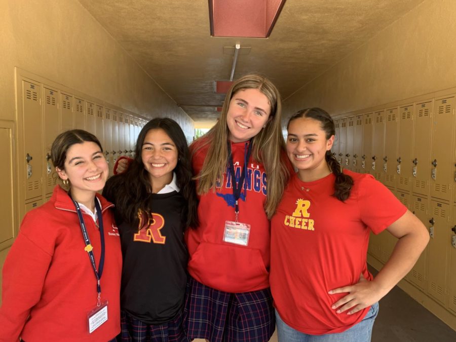 Here are four out of the eight Rosary girls walking the runway in the fashion show. 
Cadiz Salazar '23 (on the left), Emma Oskorus (second left), Reagan Beuerlein '23 (second right), and Victoria Gomez '23 (on the right). 
