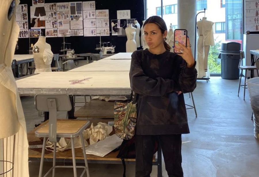 Kate Rosales strikes a pose in an Otis fashion classroom. (Photo Credit: Kate Rosales)