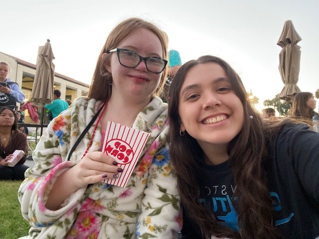 My camper and I smile at a "High School Musical" movie night on the lawn!