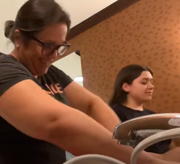 My mom and I working as a tag team in the hotel bathroom.