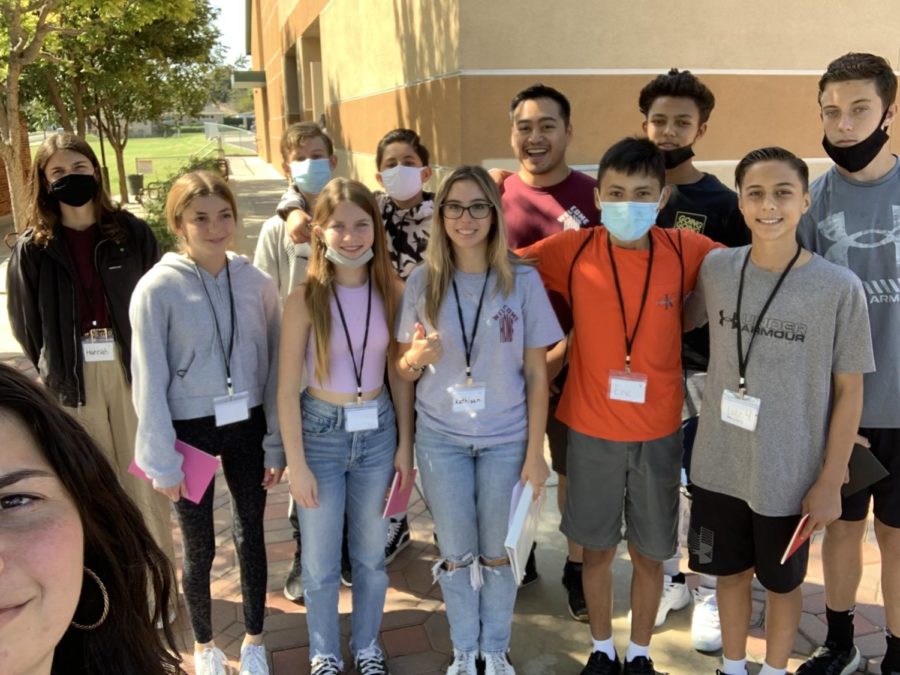 Angelina and I smile with our confirmation group as well with as our confirmation leader during a retreat. (Photo Credit: Angelina Sances)