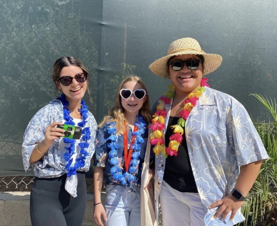 Cadiz Salazar '23 and Samantha Guerrero '23 with prospective student (and Shadow) Mary Jane. 