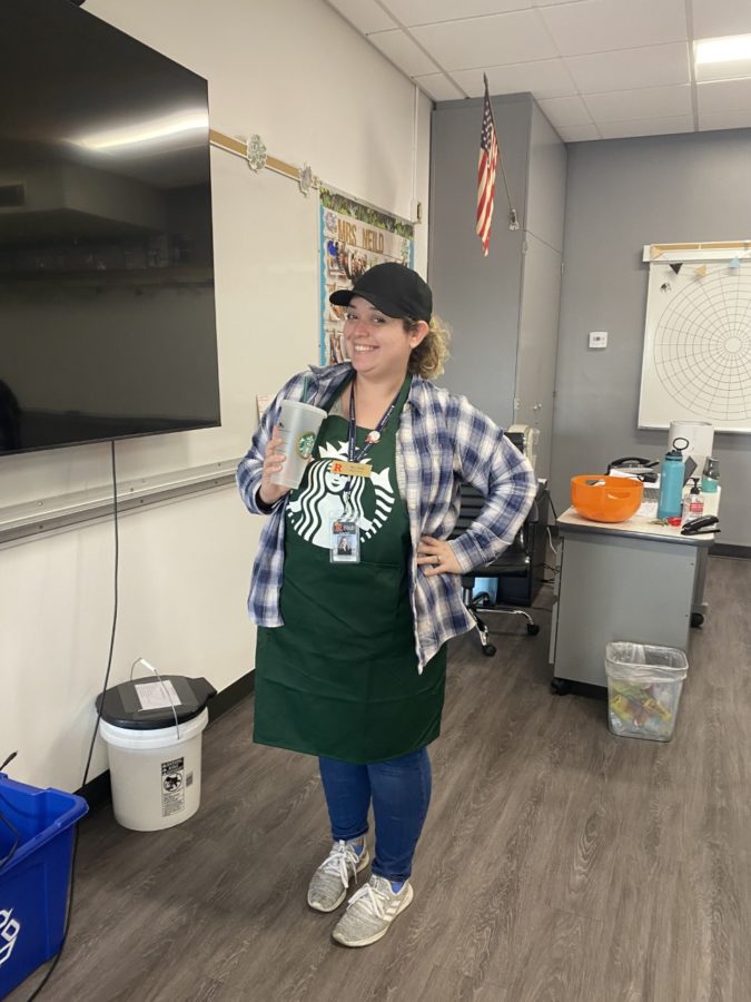 Mrs. Neild posing as your friendly local starbucks barista.