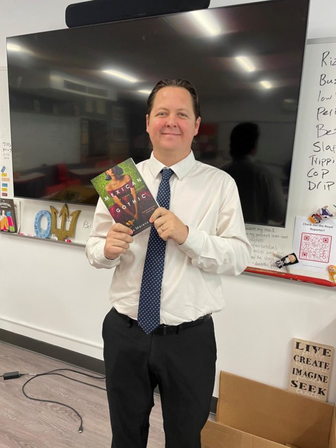 Mr. Bevins proudly displaying one of his recommendations. (Photo Credit: Andrea Salazar)
