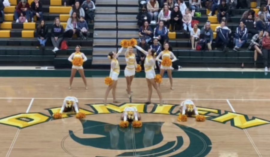 The Rosary Dance Team's pom theme this year is gold. (Photo provided by Julianna Ortiz)