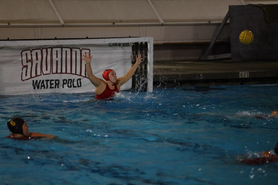 Goalie, Avery Rabago '25, saving a shot during the last tournament.