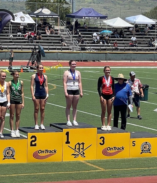 Senior Colleen Schmitt takes the top spot in the CIF D-4 pole vaulting championship. (Photo Credit: Mr. Schmitt)